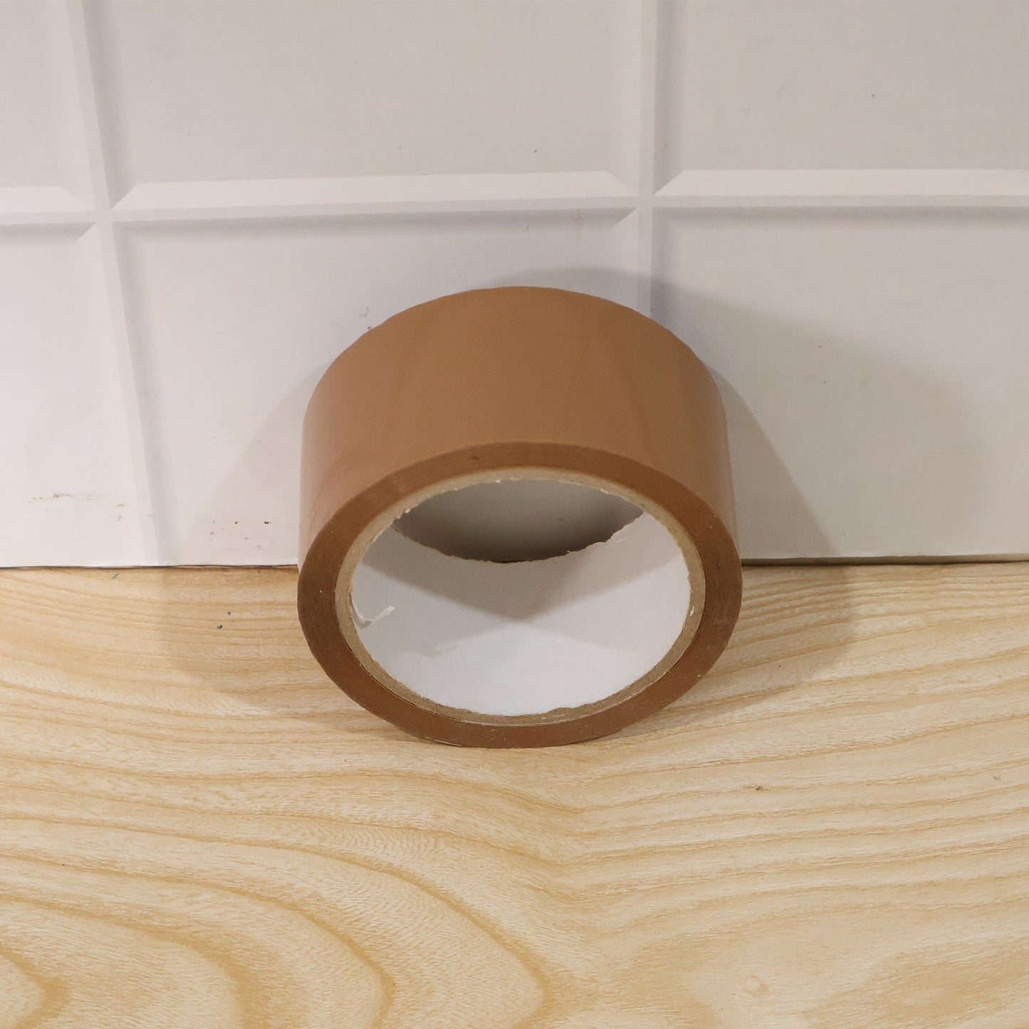 Pack of brown cello tape for shipping and packing
