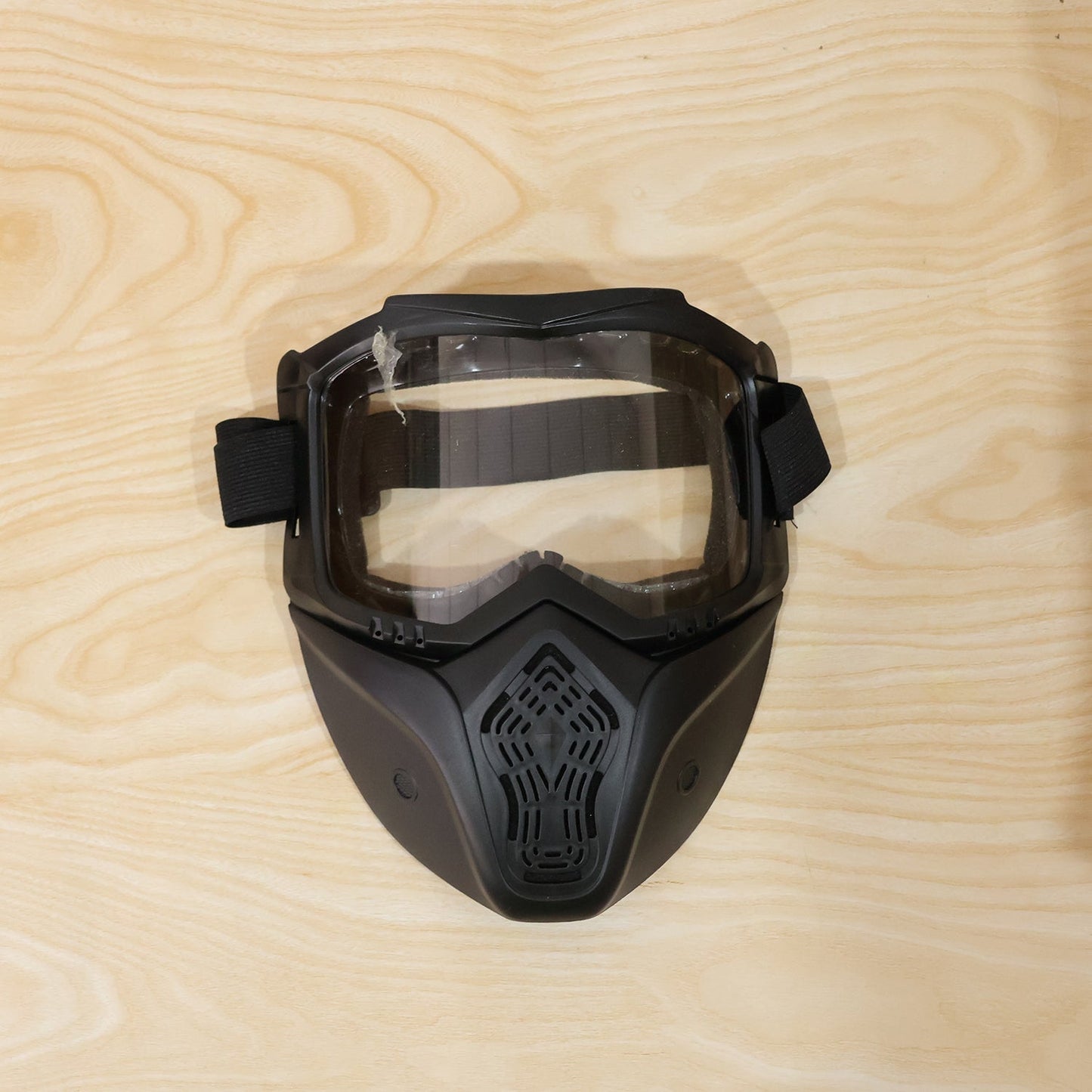 Close-up of rider wearing protective bike goggle mask during ride