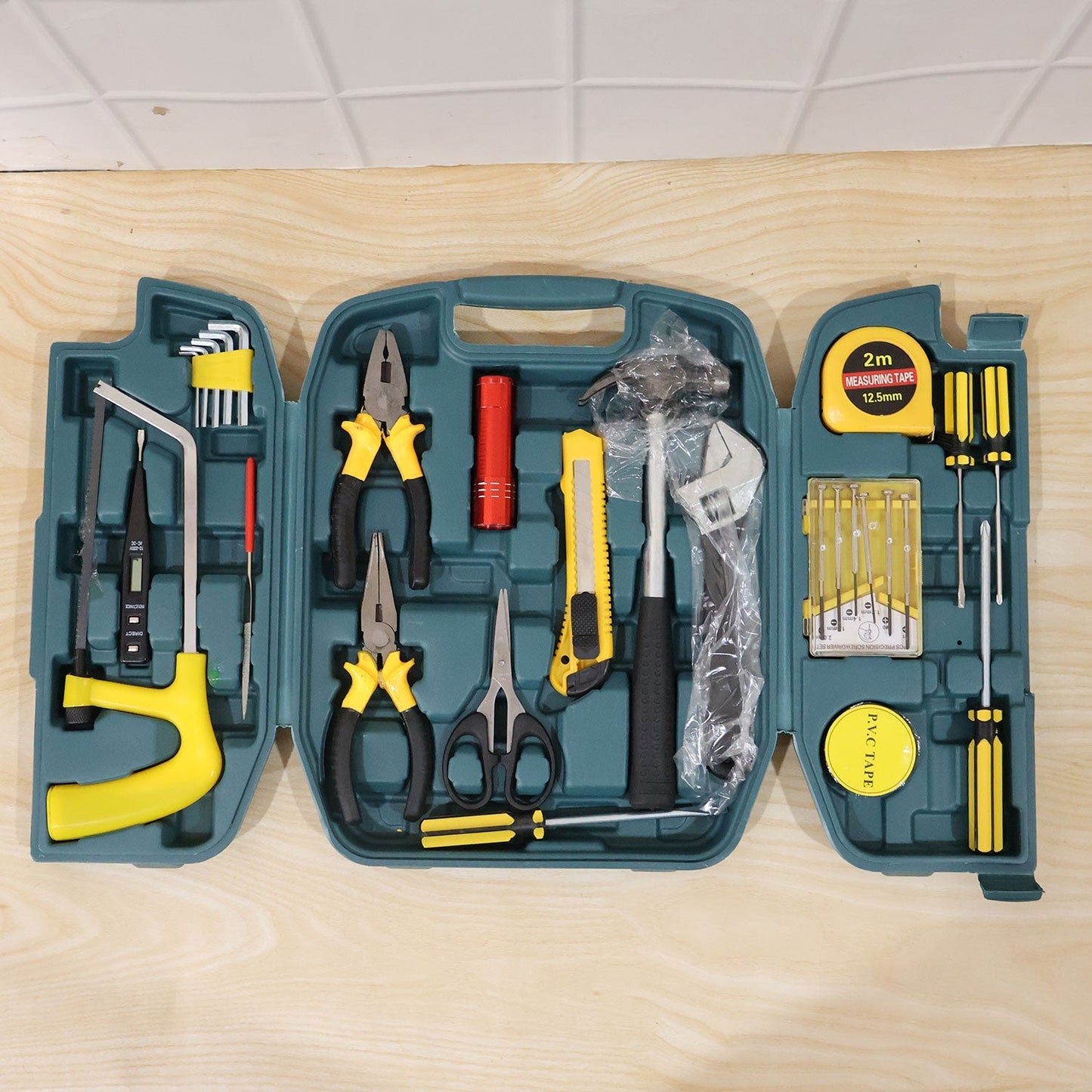 Yellow and sturdy carry case of Home Tool Kit, ready for storage.