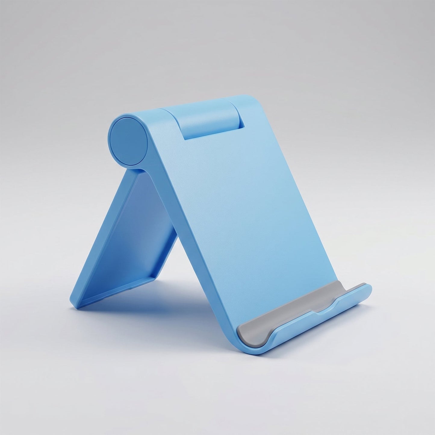 Foldable mobile phone stand in packing box.