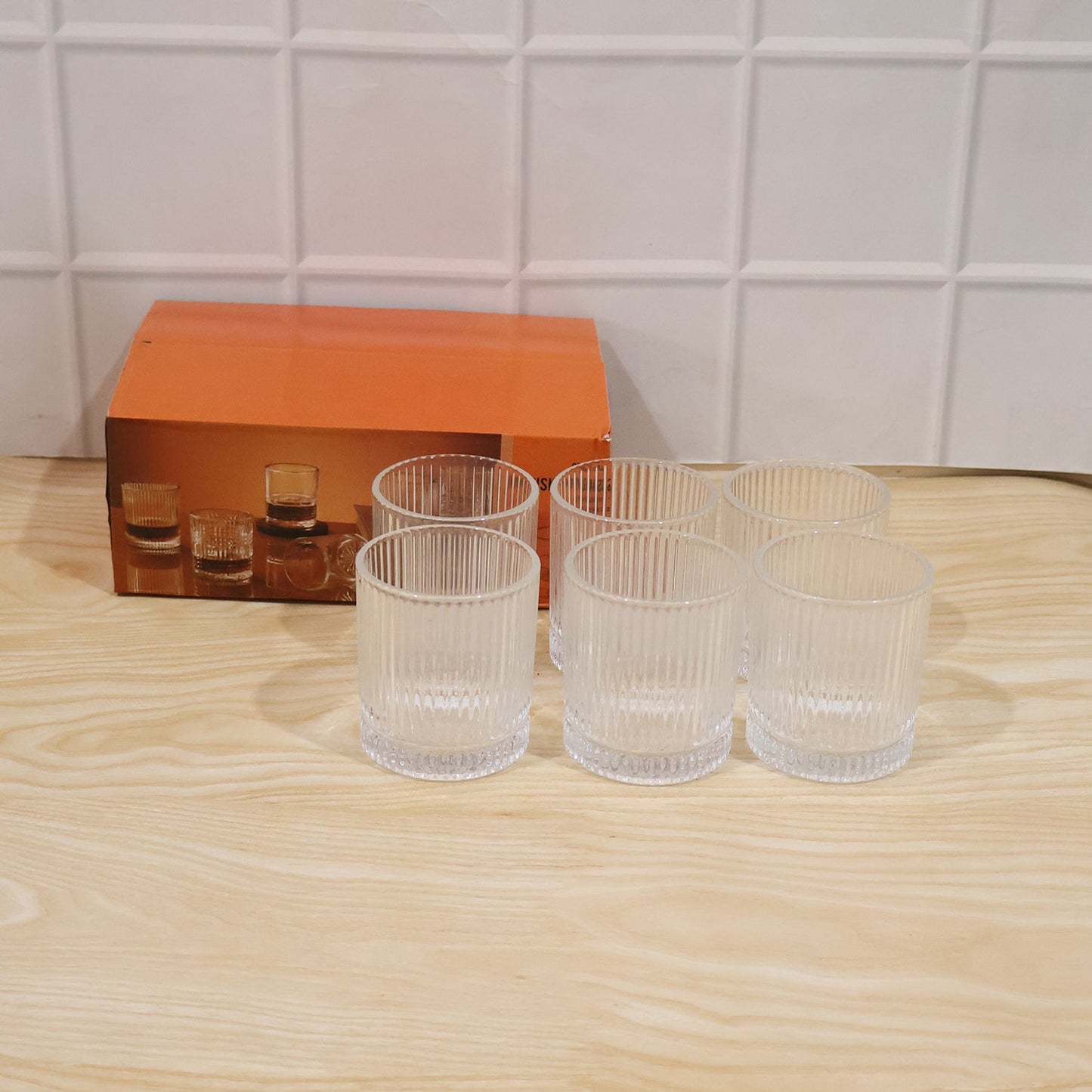 Close-up of ribbed crystal tumbler highlighting stylish texture