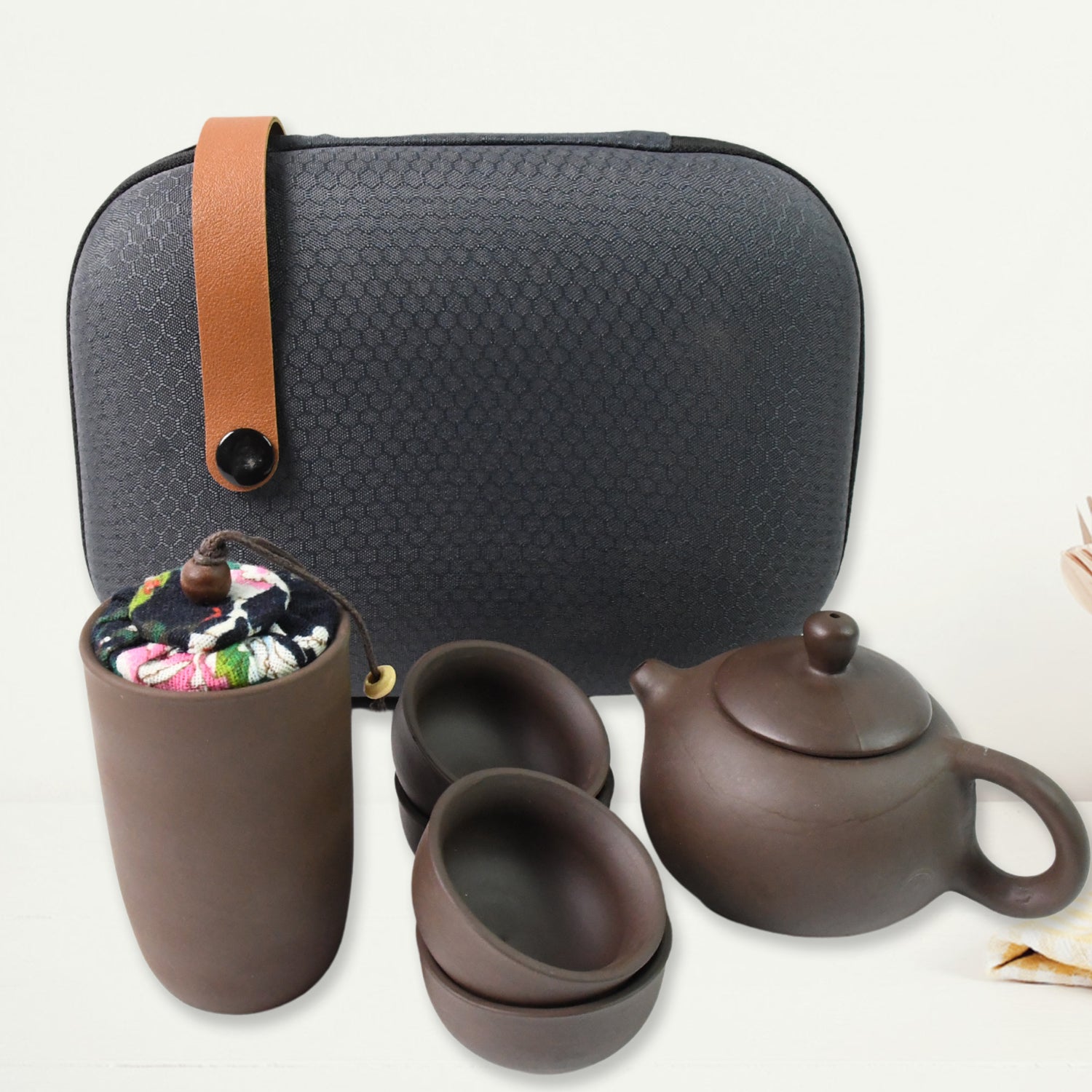 Elegant purple sand ceramic teapot & matching tea cups for authentic brewing