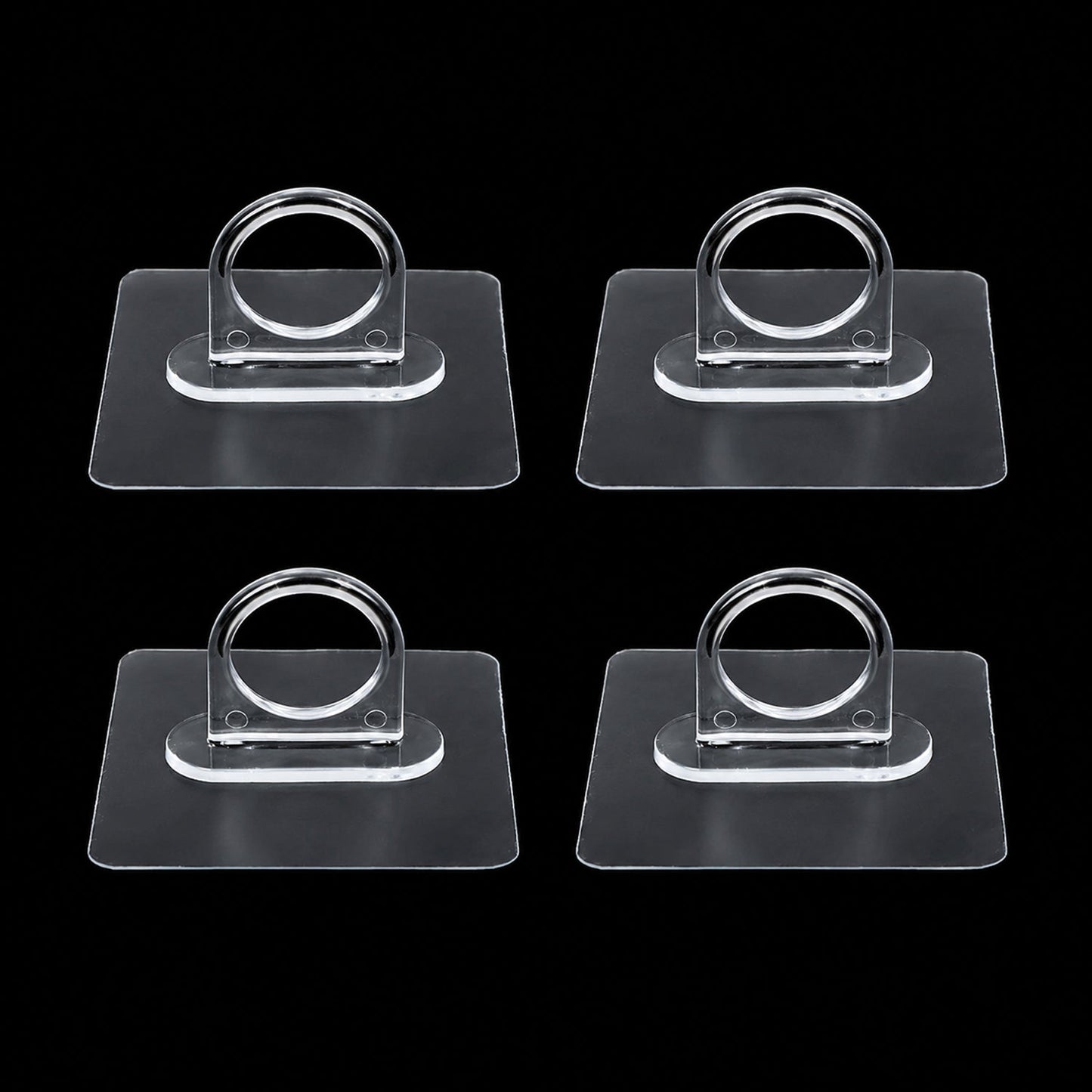 Adhesive plastic wall hook 4-piece set mounted on wall for home organisation