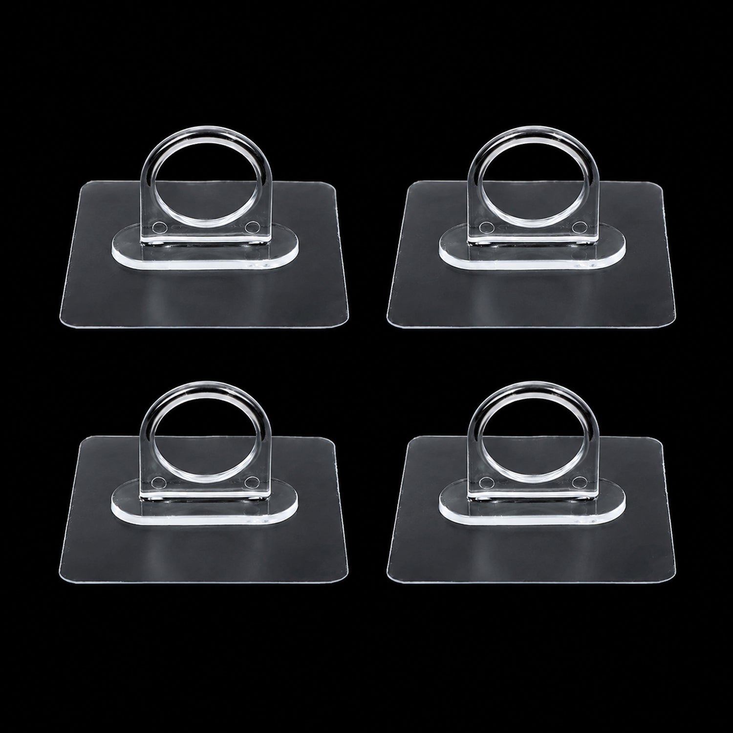 Adhesive plastic wall hook 4-piece set mounted on wall for home organisation