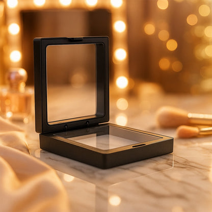 Close-up of membranes suspending jewelry in floating display box