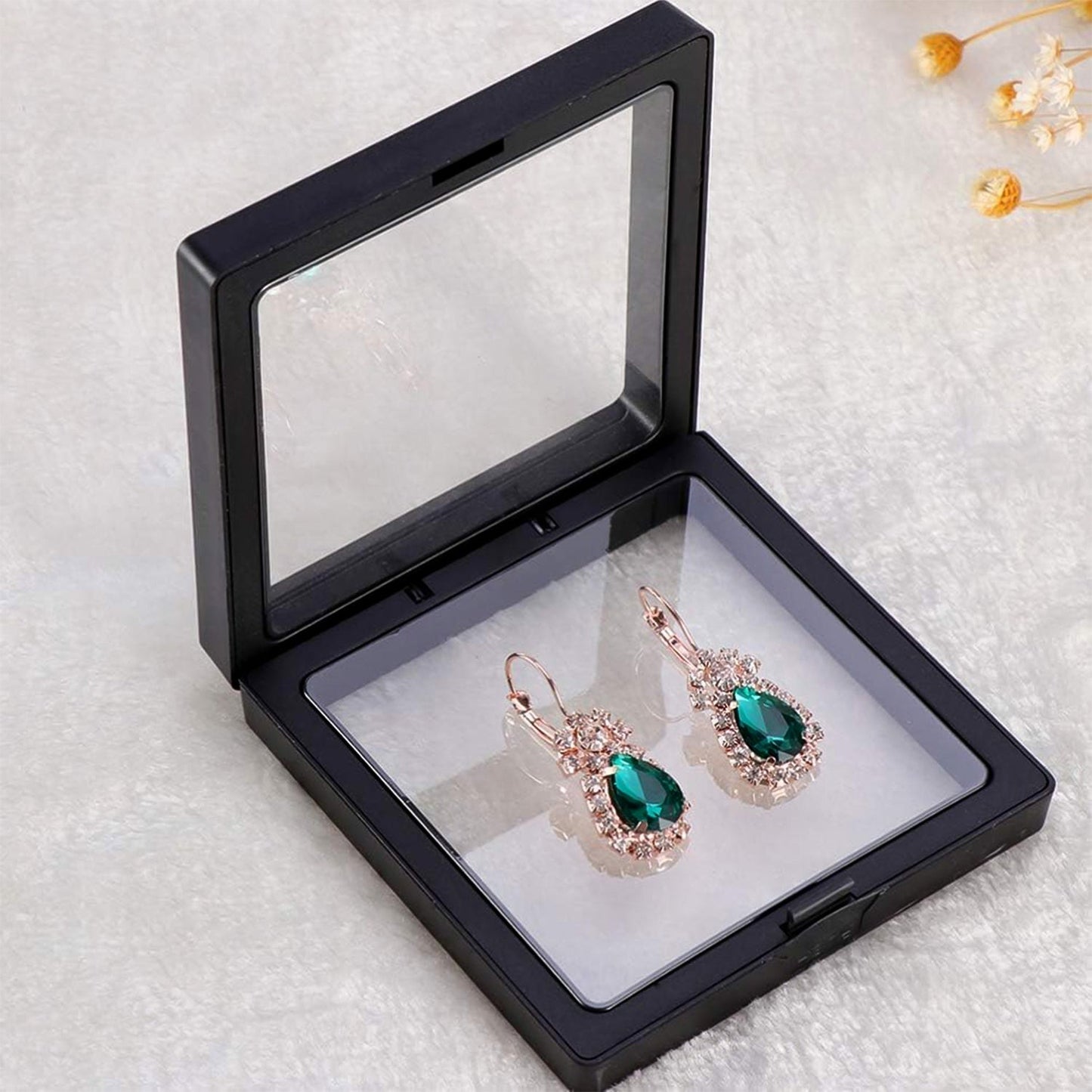 Floating frame jewellery display case for elegant presentation
