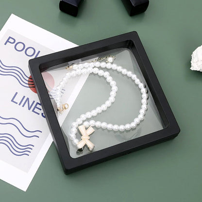 Clear floating jewellery display case with magnetic lock
