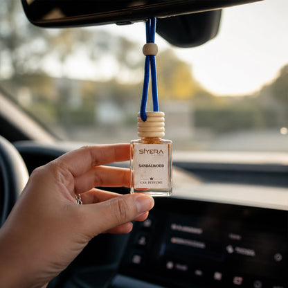 Close-up of the natural wooden cap on Siyera Sandalwood Car Perfume bottle.