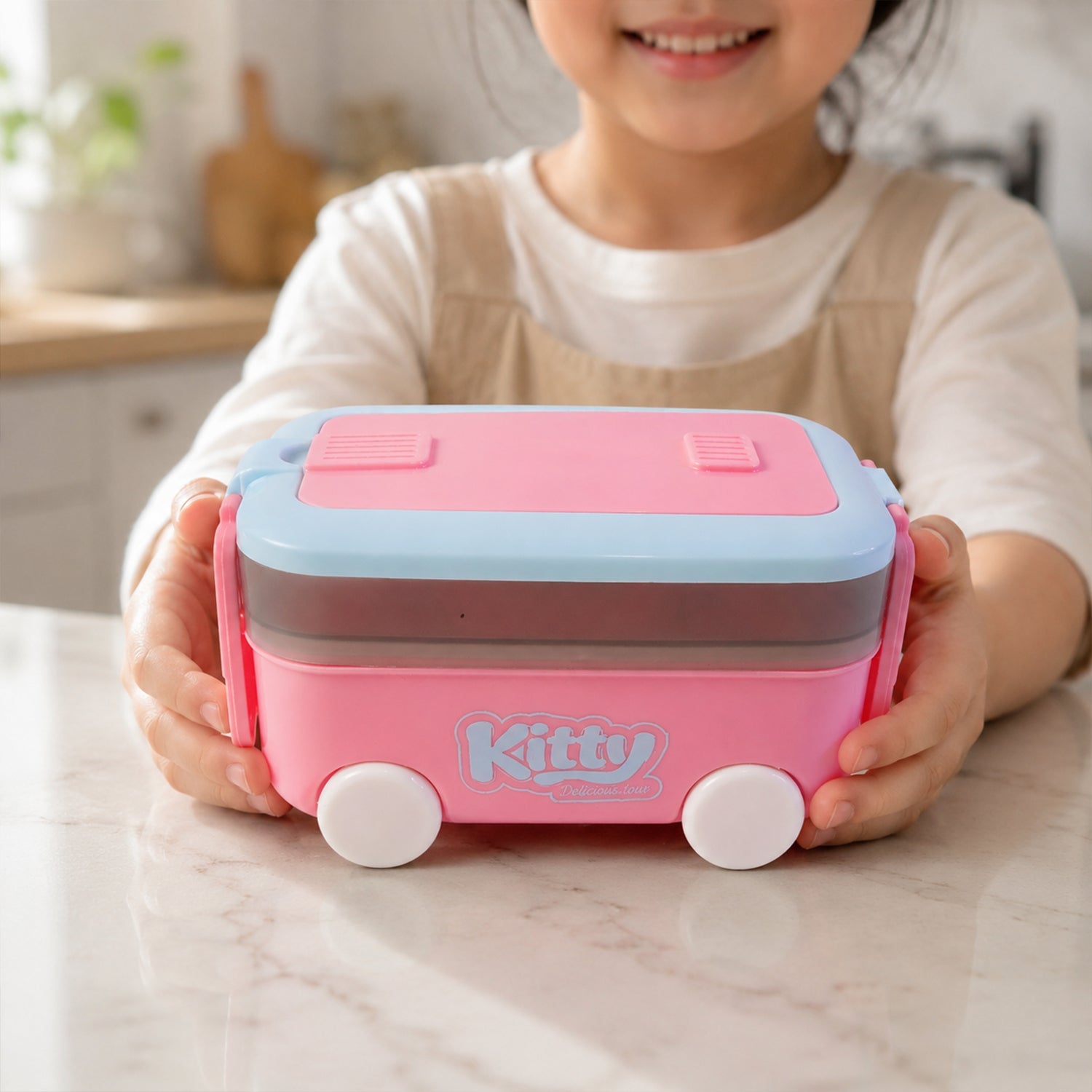 Kids lunch box with spoon and fork set in bright pink