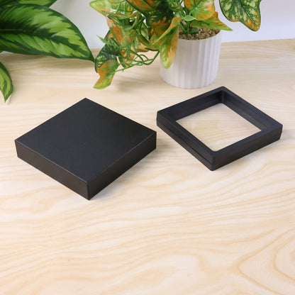 Compact transparent jewellery display box on table
