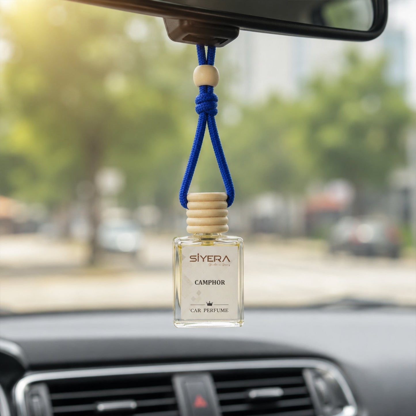 Elegant white background of hanging car perfume