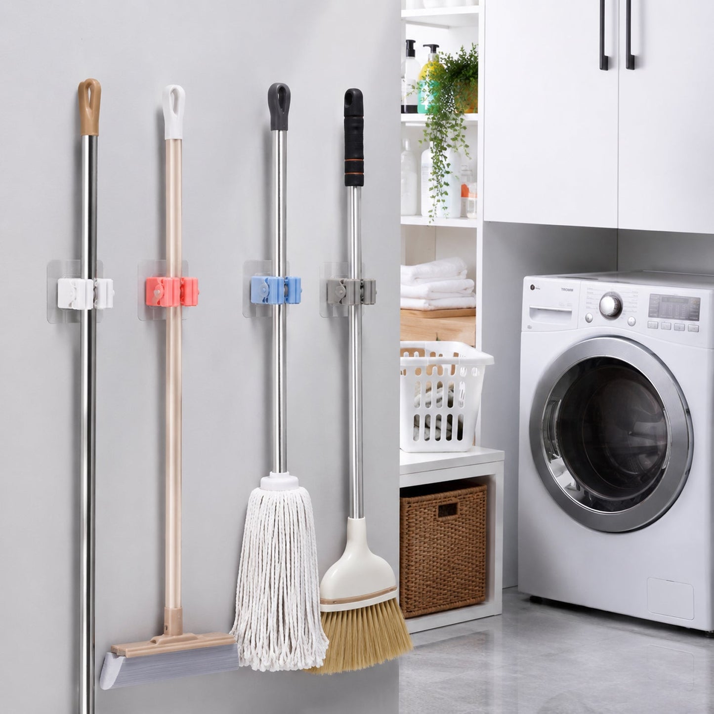 Organized cleaning tools with wall-mounted broom holder