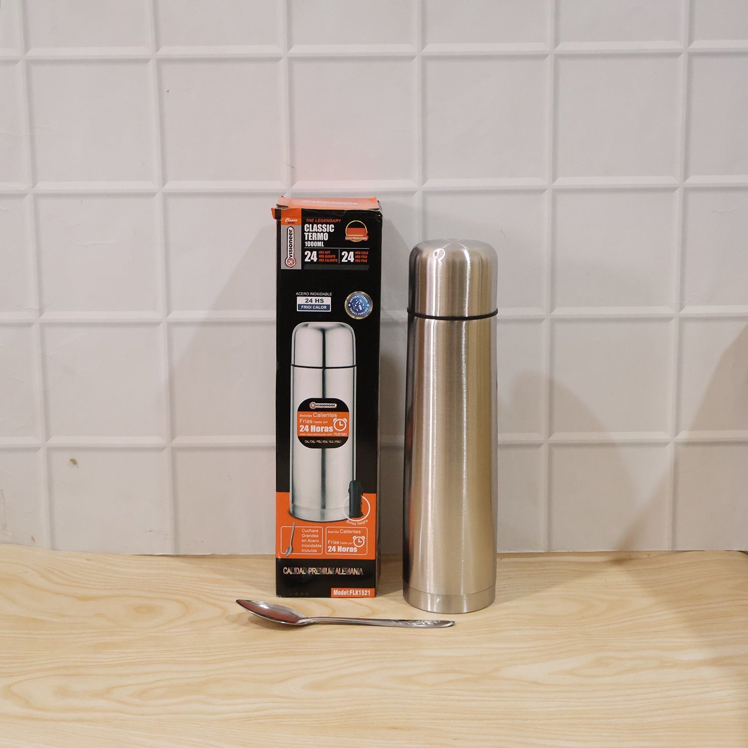 Office-ready stainless steel vacuum flask with ergonomic design