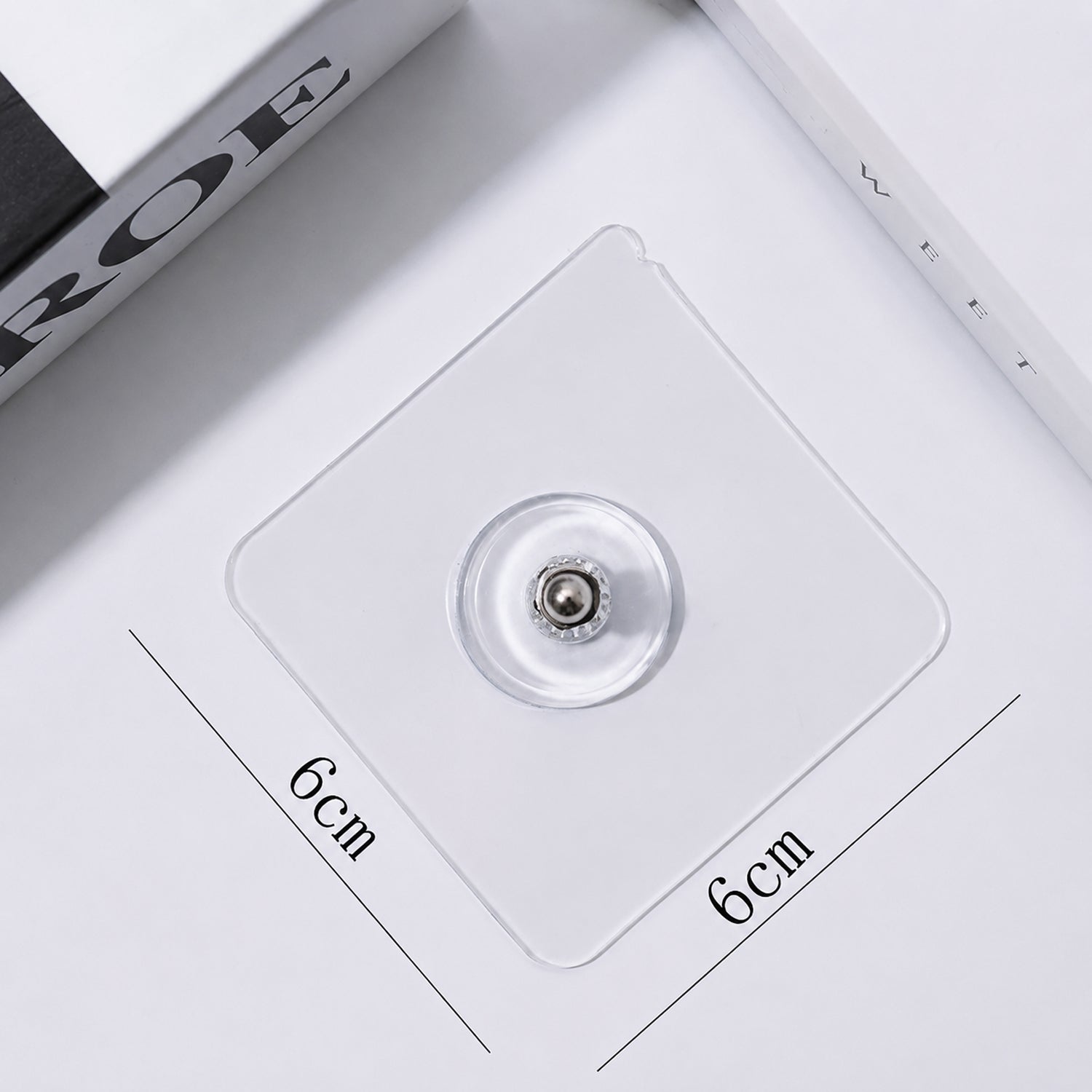 Removable wall hook demonstrating damage-free removal