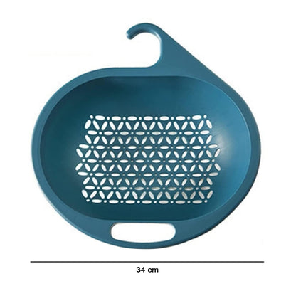 Kitchen drain basket strainer in use on sink for washing and draining