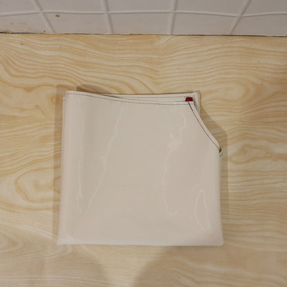 Person wearing waterproof apron while cooking in kitchen