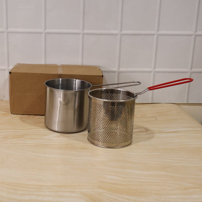 Complete frying set with pot and basket in packaging