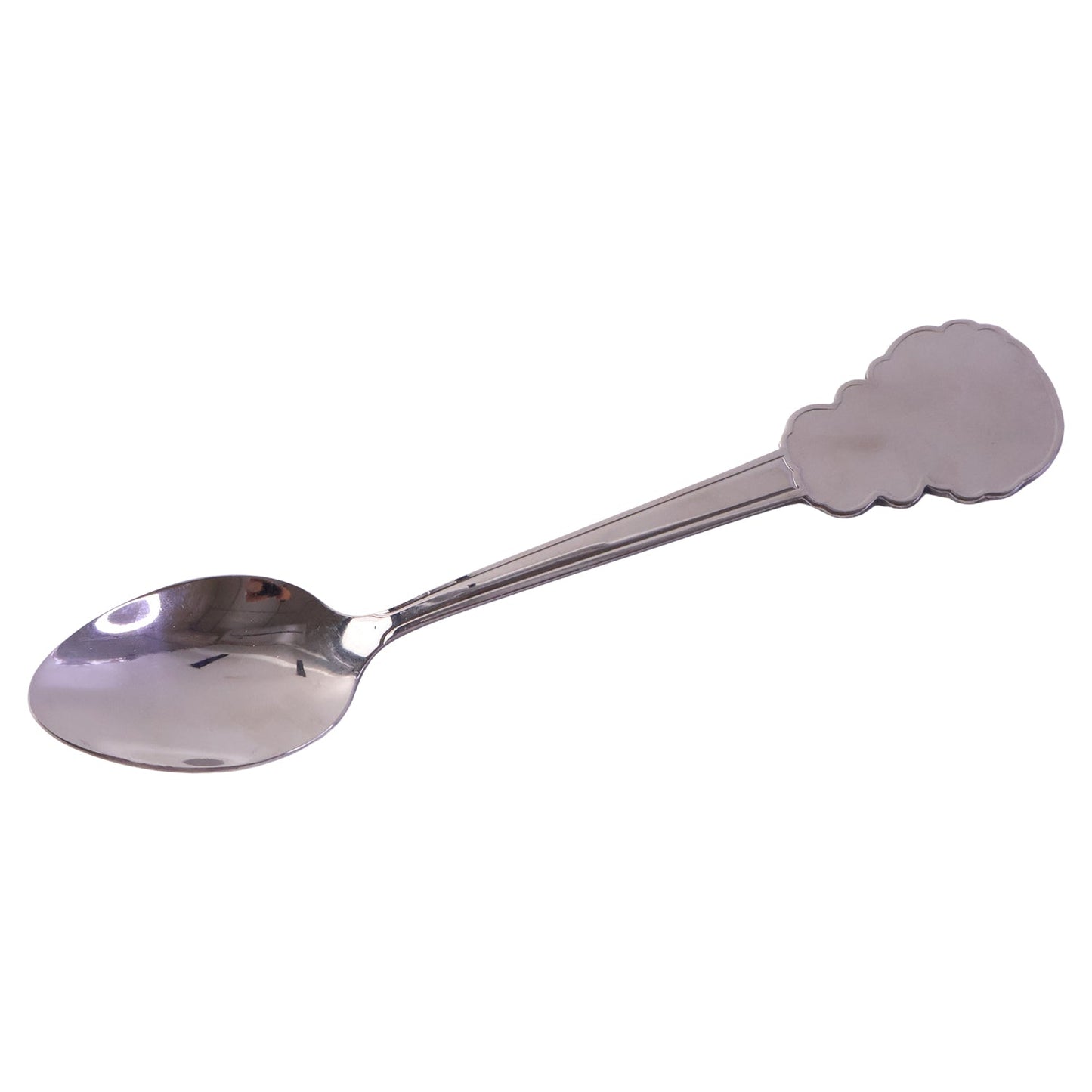 White background close-up of stainless steel dinner spoon showing carved handle