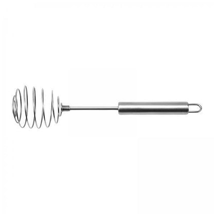 Egg beater whisk in white background for kitchen tasks