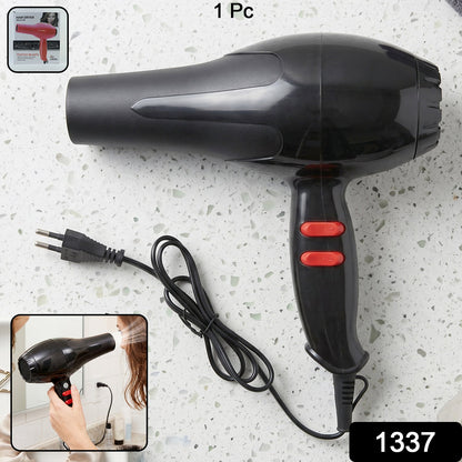 Retail packaging of the compact blow dryer.
