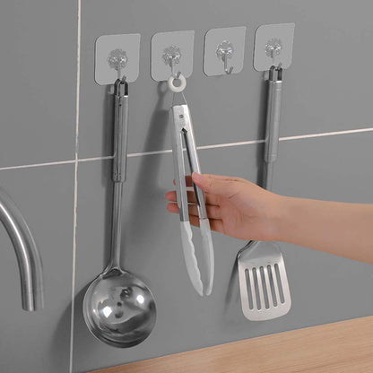 Wall hooks being used to hang items in home