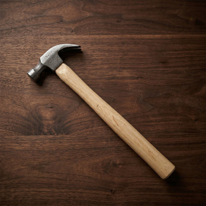 Claw hammer with wooden handle, perfect for nail pulling