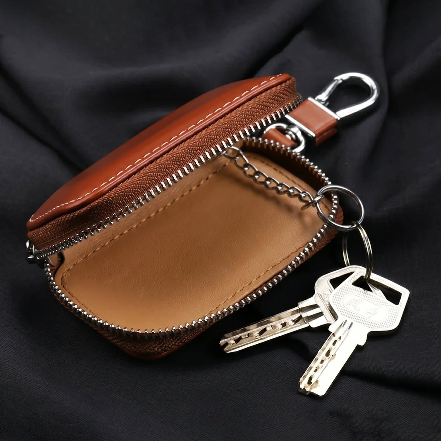 Car key pouch attached to belt loop showing clip