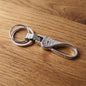 Heavy-duty metal key holder with swivel hook and chrome finish
