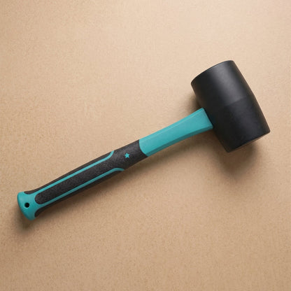 Rubber mallet with fiberglass handle and non-slip grip
