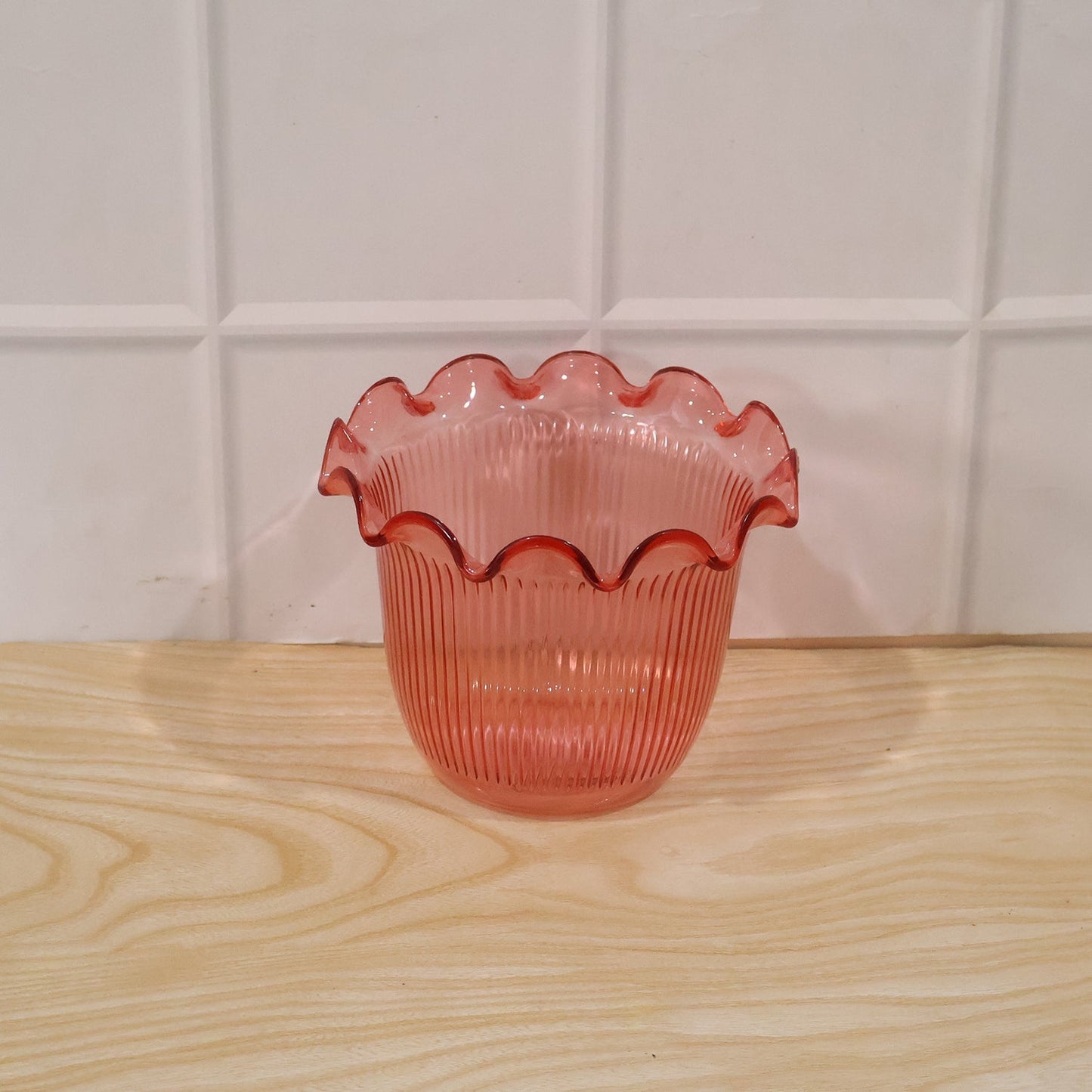 Daily use decorative flower pot displayed on a shelf