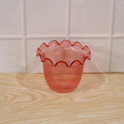 Daily use decorative flower pot displayed on a shelf