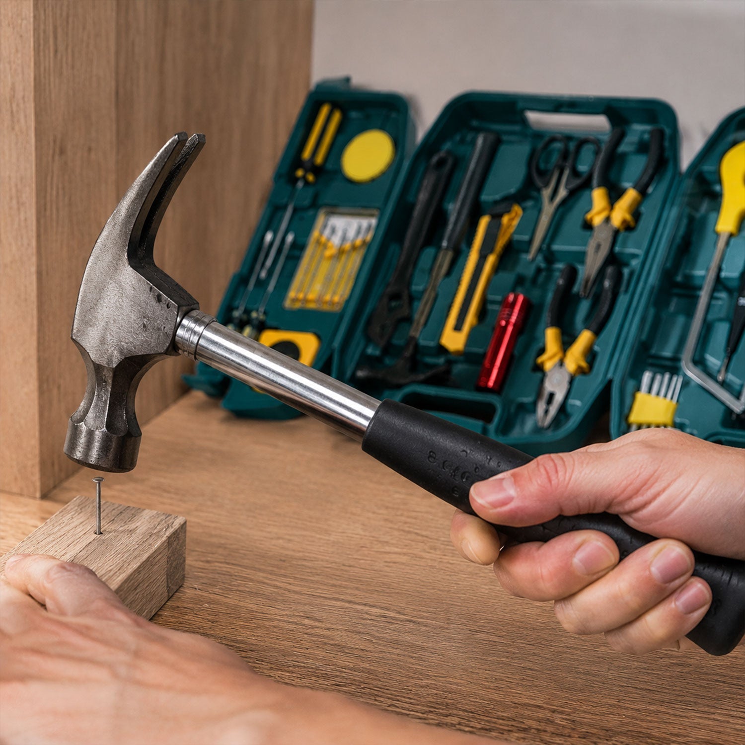 Tools laid out from  Home Tool Kit Set for various household repairs.