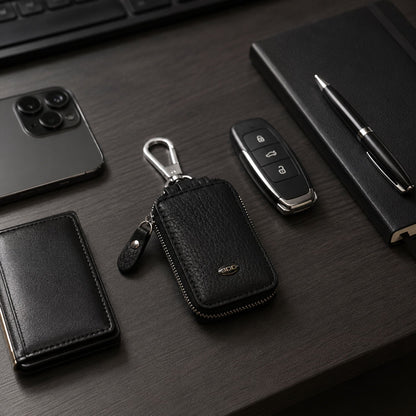 Black PU leather car key case with zipper and metal clip hook.