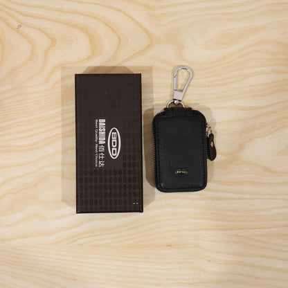 Car key holder in retail packaging display.