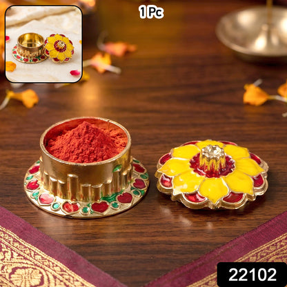 Decorative kumkum holder with intricate gold finish for pooja
