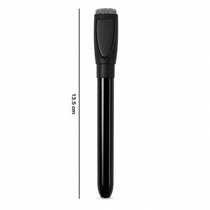 Dry erase marker next to a ruler showing its length.