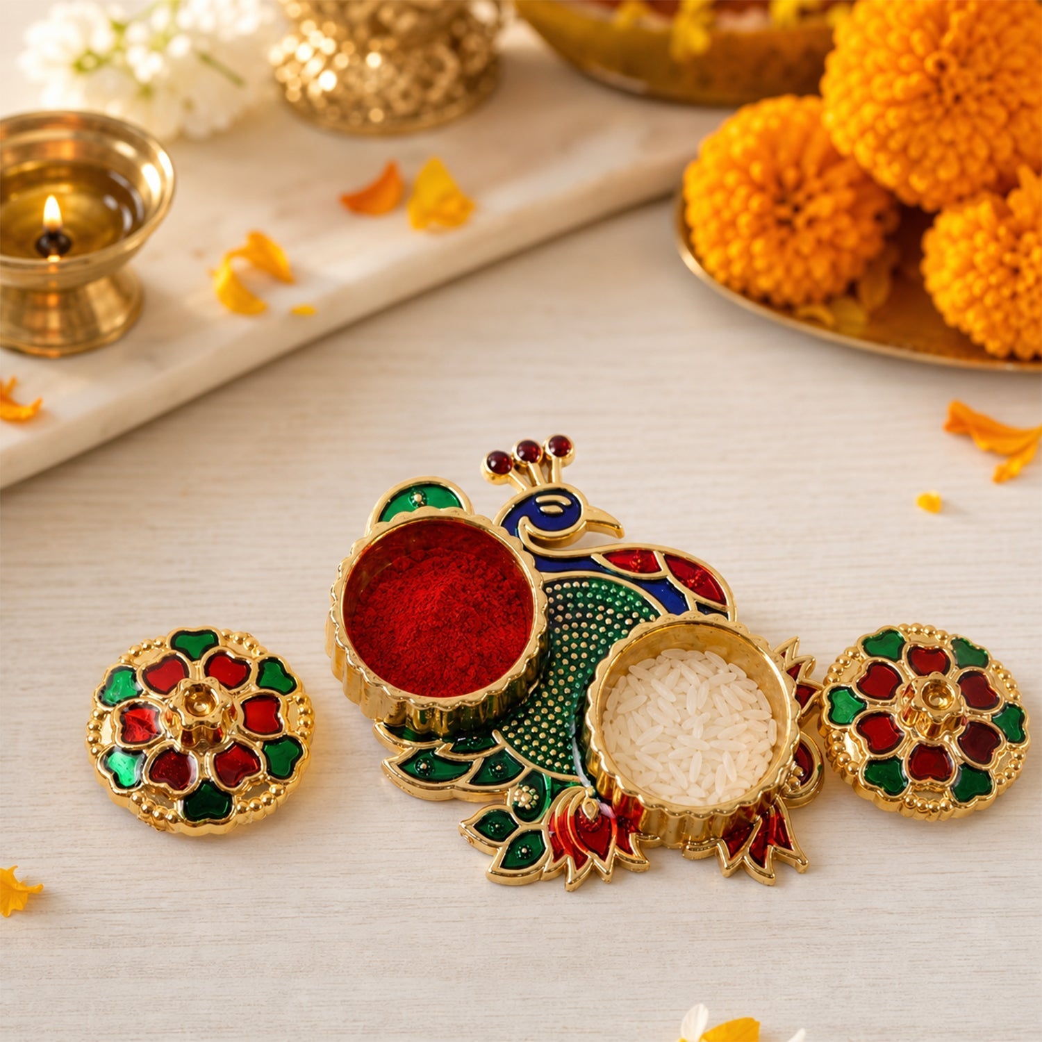 Golden peacock kumkum dani with stone work as a decorative pooja accessory