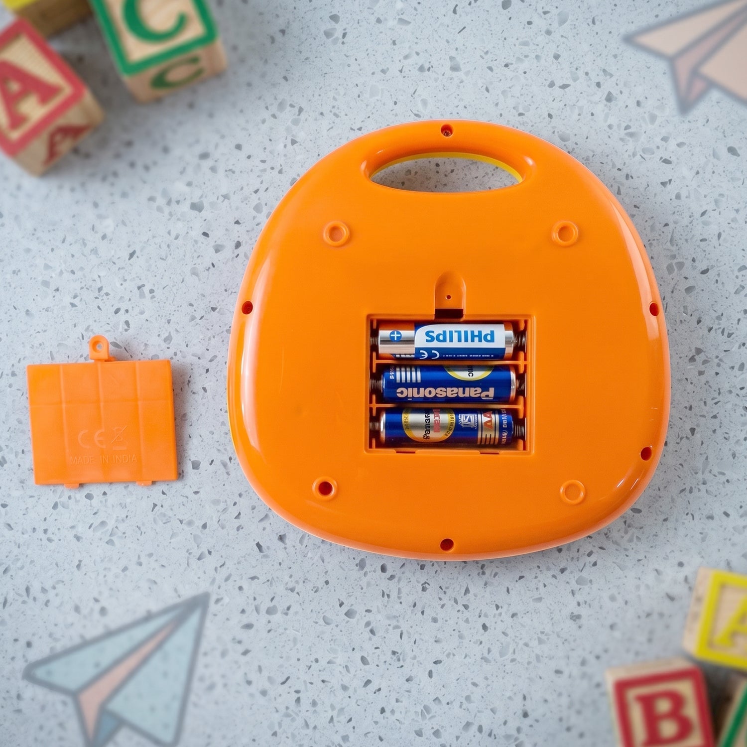 Close-up of laptop toy buttons for interactive learning