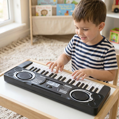Children playing on a musical keyboard toy, developing coordination