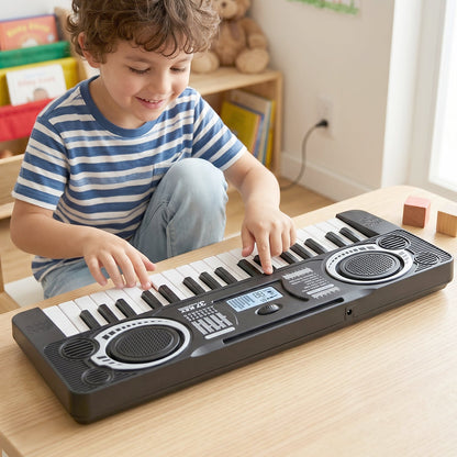 Musical keyboard toy in use, with kids enjoying interactive play