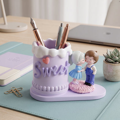 Sweet couple pen holder on white background, decorative desk accessory