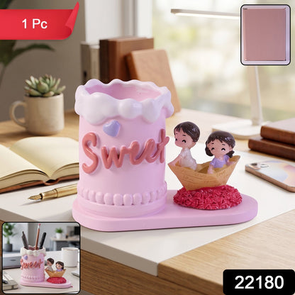 Pink resin couple pen holder packaged for gifting