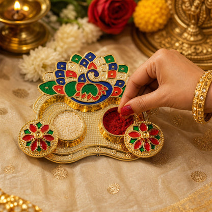 Decorative peacock-shaped kumkum holder with jewel accents