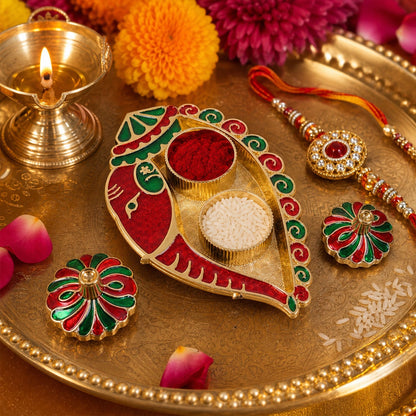 Leaf shaped kumkum holder with twin compartments and enamel work