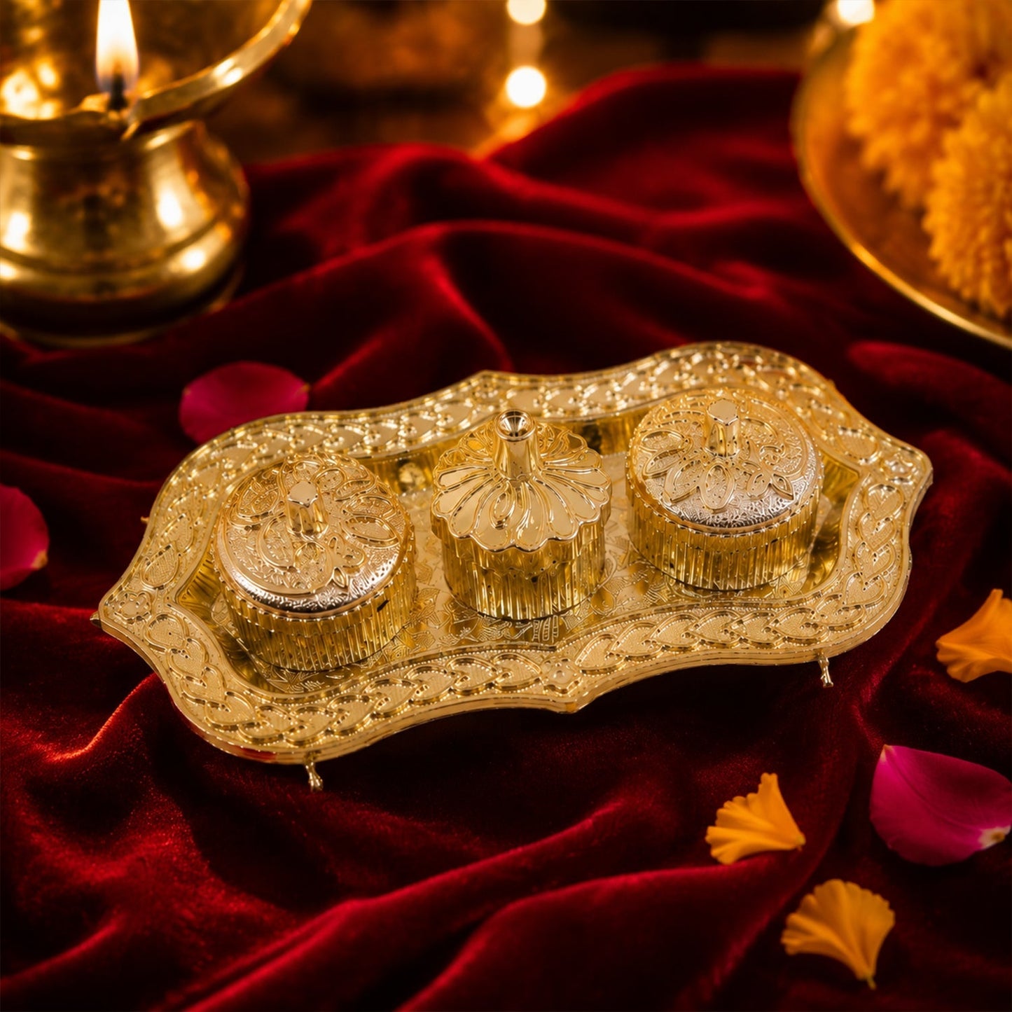 Close-up of the ornate golden Kankavati for puja rituals.