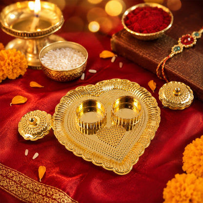Detail view of heart kumkum holder with intricate beading