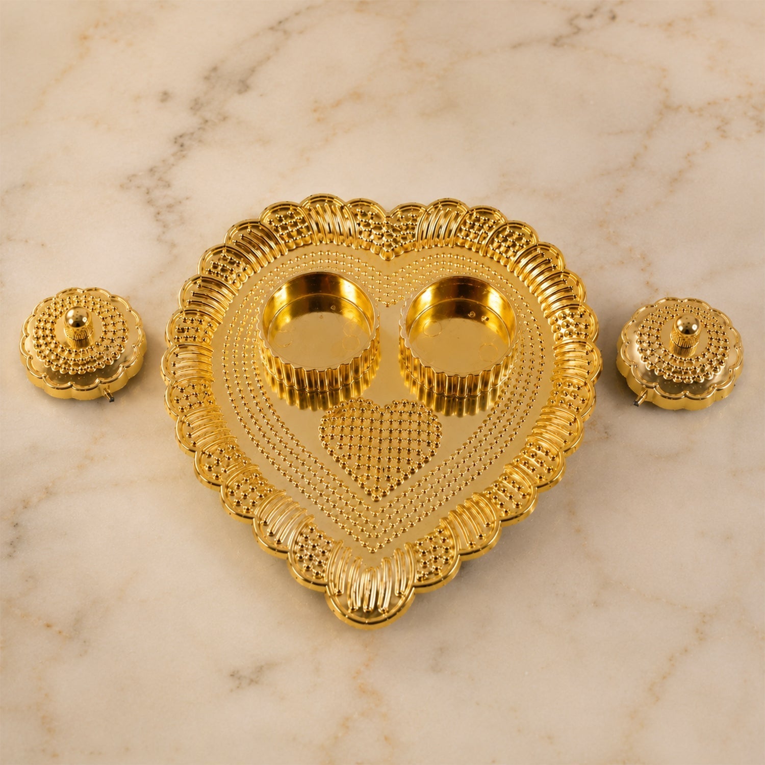 Design view of heart-shaped kumkum holder