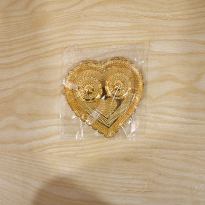 Packaged heart-shaped kumkum holder for gifting