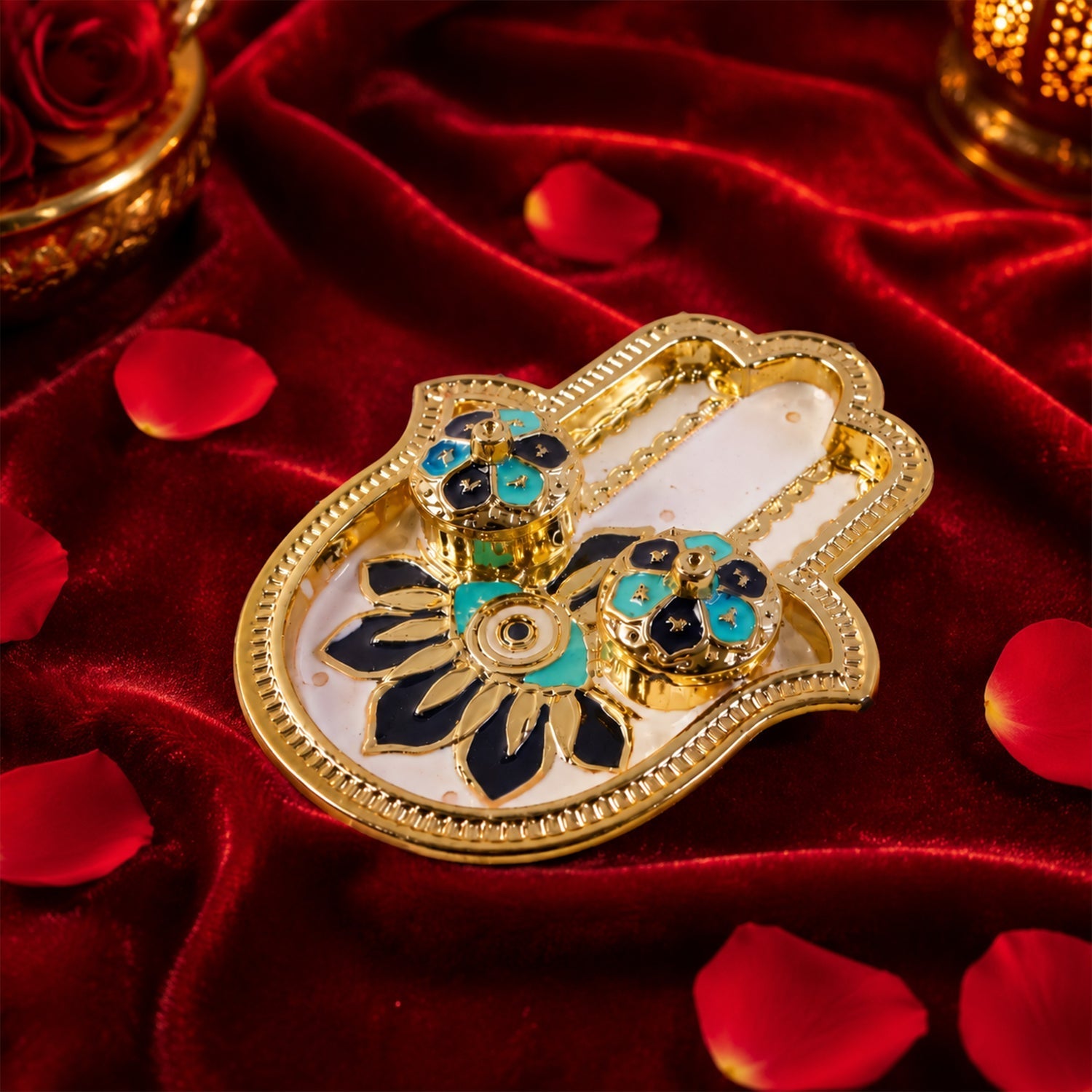 View of the hand-shaped kankavati with decorative enamel work