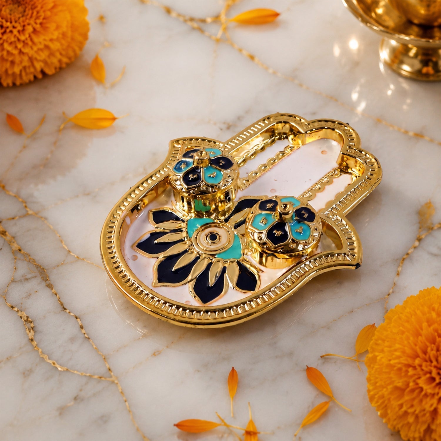 Kumkum holder in use on a pooja thali during worship